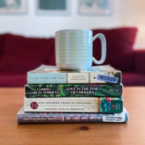 Stack of books and coffee mug